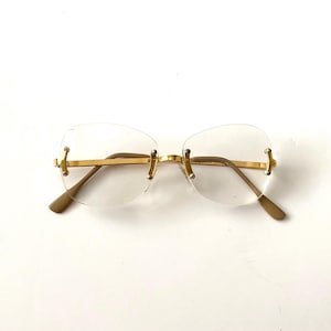 womens vintage retro gold POLARIS rimless glasses specs size