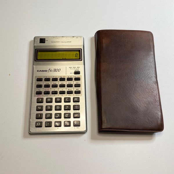 Vintage retro CASIO FX-3100 Electronic scientific pocket calculator