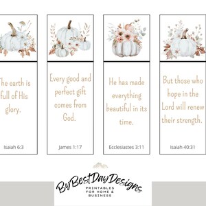 May include: Four rectangular bookmarks with watercolor illustrations of white pumpkins and floral arrangements. Each bookmark features a different Bible verse in a serif font. The text includes Isaiah 6:3, James 1:17, Ecclesiastes 3:11, and Isaiah 40:31.