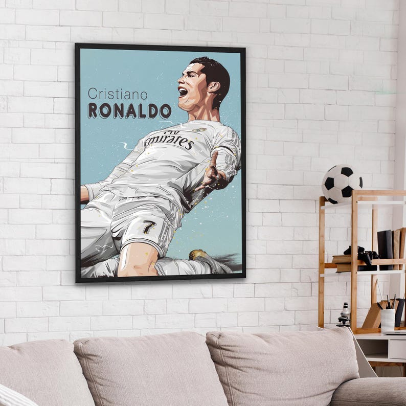 May include: A digital illustration of Cristiano Ronaldo wearing a white football shirt with the text "Cristiano RONALDO" and "Fly Emirates" on the shirt. The background is a light blue colour.