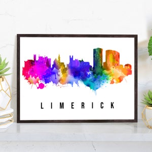 May include: A watercolor painting of the Limerick skyline in rainbow colors. The city's buildings are silhouetted against a white background. The word "LIMERICK" is printed in black at the bottom of the image.