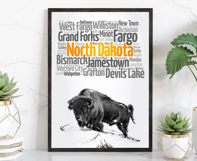 May include: A black and white illustration of a buffalo with the text "North Dakota" in orange and a list of cities in gray.