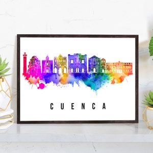 May include: A watercolor illustration of the Cuenca, Ecuador skyline with a rainbow color scheme. The city's buildings are outlined in white and the city name is written in black below the skyline.