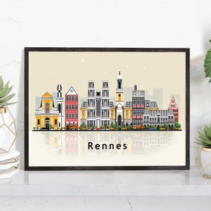 May include: A colorful illustration of the Rennes skyline, featuring several buildings with a reflection of the city in the water below. The text "Rennes" is printed below the illustration.