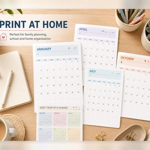 May include: A set of printable calendar pages featuring January, April, July, and October, along with a 2027 year-at-a-glance sheet. The pages display grid layouts with headers, dates, and small icons. The text PRINT AT HOME is clearly visible.