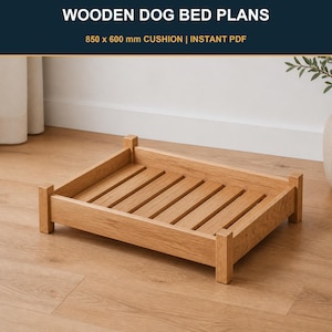 May include: A rectangular wooden dog bed frame with a slatted base and four corner posts. The text at the top reads WOODEN DOG BED PLANS and 850 x 600 mm CUSHION | INSTANT PDF. The frame is constructed from light brown wood with a visible grain.