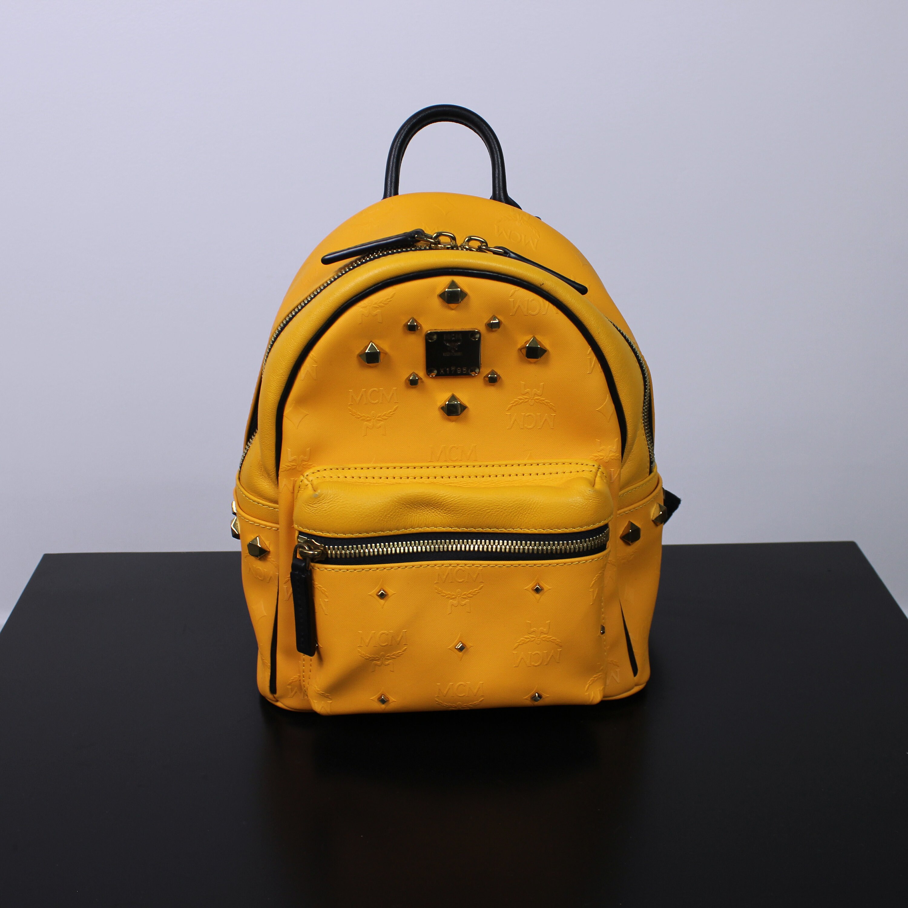 Mcm backpack yellow Clearance
