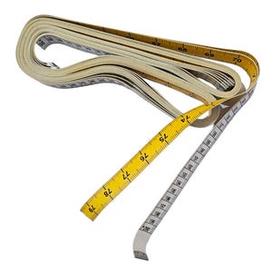 May include: A yellow and white measuring tape is rolled up and partially unrolled. The tape is marked with numbers in black. The tape is about 78 inches long.