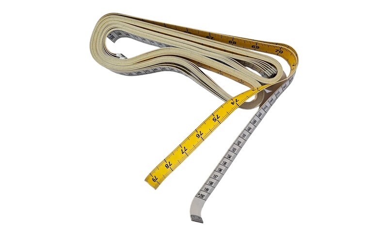 May include: A yellow and white measuring tape is rolled up and partially unrolled. The tape is marked with numbers in black. The tape is about 78 inches long.
