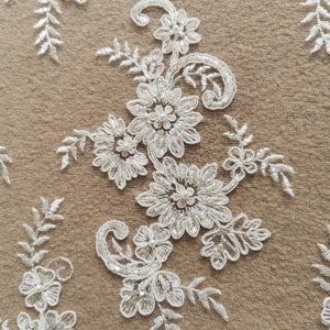 Size medium to xl Preorder allow 6 to 8 week Poetry ivory in embroidery lace with chiffon  lining