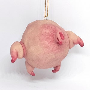 Enfeite de peru pendurado estranho: decoração de Natal peculiar