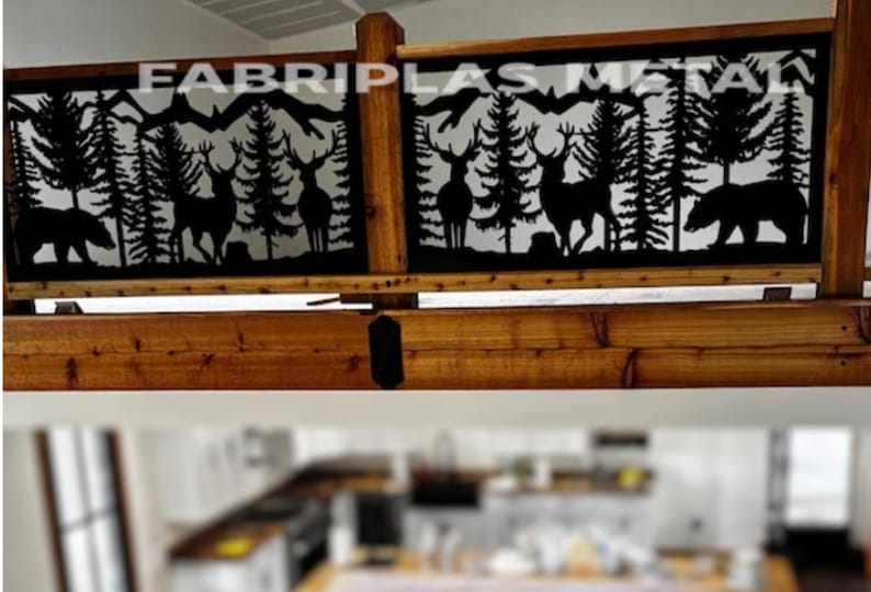 May include: A wooden railing featuring two black metal panels with laser-cut silhouettes of deer, bears, and pine trees against a mountain backdrop. The text FABRIPLAS METAL is visible across the top of the panels, which are framed by wood.