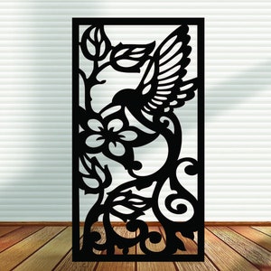 May include: Black silhouette of a hummingbird with outstretched wings, perched on a branch with a flower. The design is intricate and detailed, perfect for a decorative wall panel or screen.