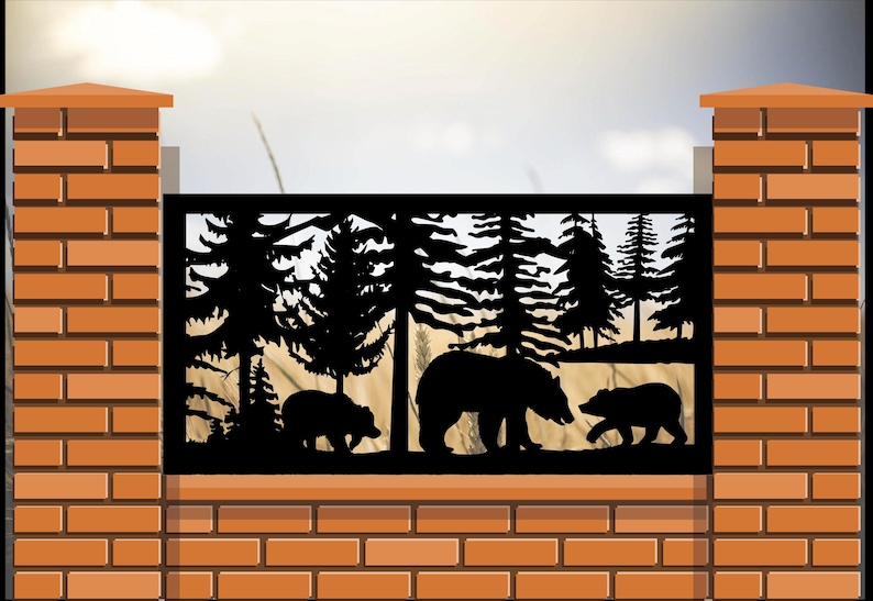 May include: A rectangular black metal fence panel featuring a laser-cut silhouette design of a forest landscape with three bears. The scene depicts a large bear walking between two smaller bears amidst tall pine trees, set against a light background.