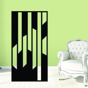 May include: Black and white geometric wall decor with vertical lines and rectangular cutouts. The decor is mounted on a light green wall.