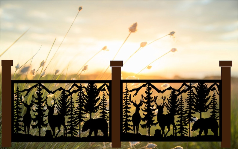 May include: A black metal fence panel featuring a laser-cut silhouette design of a forest landscape. The pattern includes two deer standing among pine trees, a bear walking on the ground, and mountain peaks along the top edge of the frame.