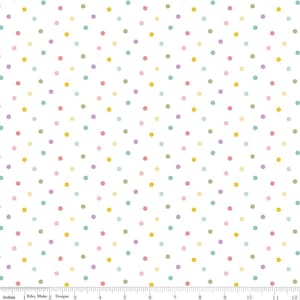 May include: White fabric with a repeating pattern of small, colorful polka dots. The dots are in shades of yellow, pink, green, blue, and purple.