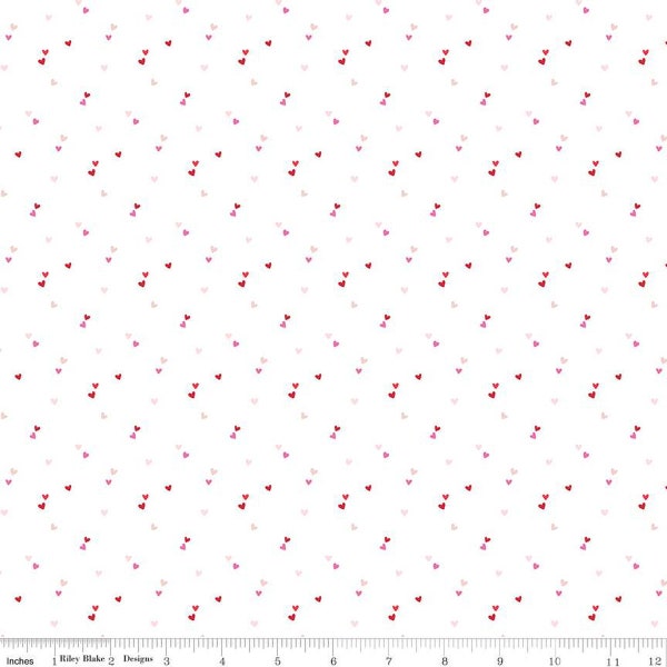 Seasonal Basics tiny pink and red hearts on a white background half yard