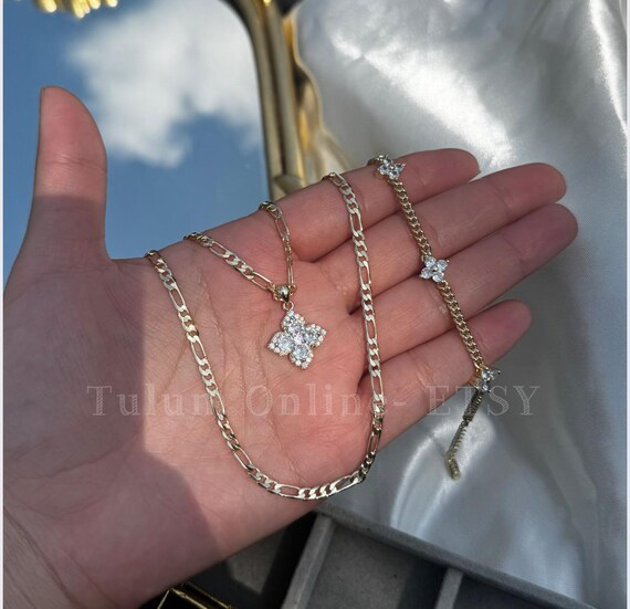 ジュエリーセット。ネックレスとブレスレットのセット。金メッキ 