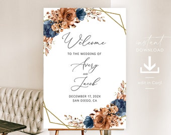 May include: A wedding welcome sign with a gold geometric frame and floral accents in shades of blue and orange. The text reads "Welcome to the wedding of Avery and Jacob, December 17, 202X, San Diego, CA".