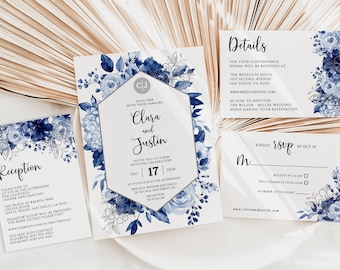 May include: Wedding invitation suite with blue floral designs. The invitation features the couple's names, "Clara and Justin", and the wedding date, "Dec 17, 202x". The RSVP card includes a space for the guest's name, a checkbox to accept with joy, a checkbox to celebrate from afar, and a line for the number attending.