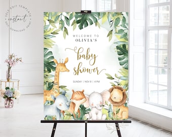 May include: Welcome to Olivia's baby shower sign with a jungle theme. The sign features a giraffe, rhino, tiger, elephant, and lion surrounded by green leaves. The text on the sign reads "Welcome to Olivia's baby shower" and "Sunday | Nov 8 | 4 PM".
