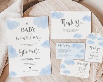 May include: A baby shower invitation with a blue watercolor cloud design. The invitation says "a baby is on the way" and includes the name "Taylor Miller". The invitation also includes the date, time, and location of the shower. There are also thank you cards and a diaper raffle card with a blue watercolor cloud design.