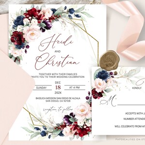 May include: Wedding invitation with a burgundy, blush, and navy floral design. The invitation features a gold geometric frame and the text "Heidi and Christian" in calligraphy. The date and time of the wedding are listed as "Sunday, December 18, 202X at 4 PM". The location is listed as "Basilica Mission San Diego de Alcala, San Diego, CA 92108".
