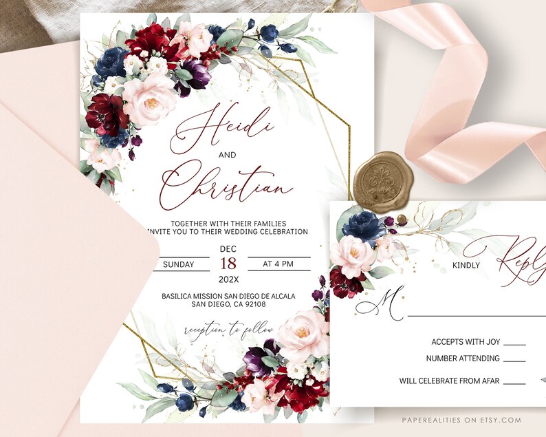 May include: Wedding invitation with a burgundy, blush, and navy floral design. The invitation features a gold geometric frame and the text "Heidi and Christian" in calligraphy. The date and time of the wedding are listed as "Sunday, December 18, 202X at 4 PM". The location is listed as "Basilica Mission San Diego de Alcala, San Diego, CA 92108".
