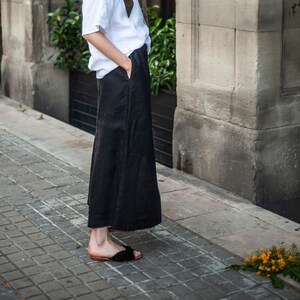 Wide-leg linen culottes with inseam pockets. Paired with contrasting white linen T-shirt