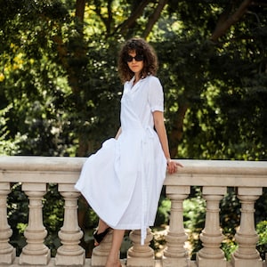 Elegant summer dress. White linen is ideal for summer occasions, including wedding, baptism, parties, and everyday! Choose this comfortable wrap dress to win the day!