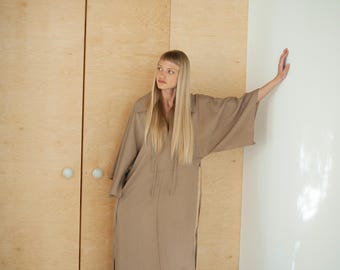 Relaxed fit kimono style med-length dress with waist tie