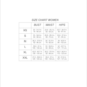 May include: Size chart for women's clothing with measurements in inches and centimeters for bust, waist, and hips. Sizes include XS, S, M, L, XL, and XXL.