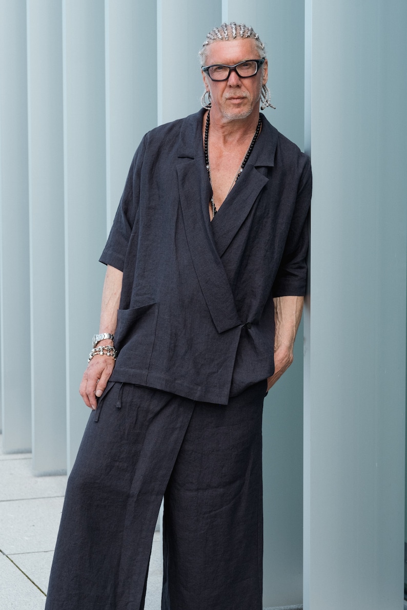 Loose-fit linen blazer with notched lapels paired with linen palazzo pants