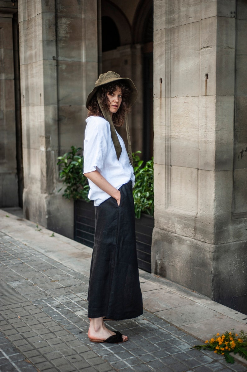 Wide-leg linen culottes with inseam pockets. Paired with contrasting white linen T-shirt