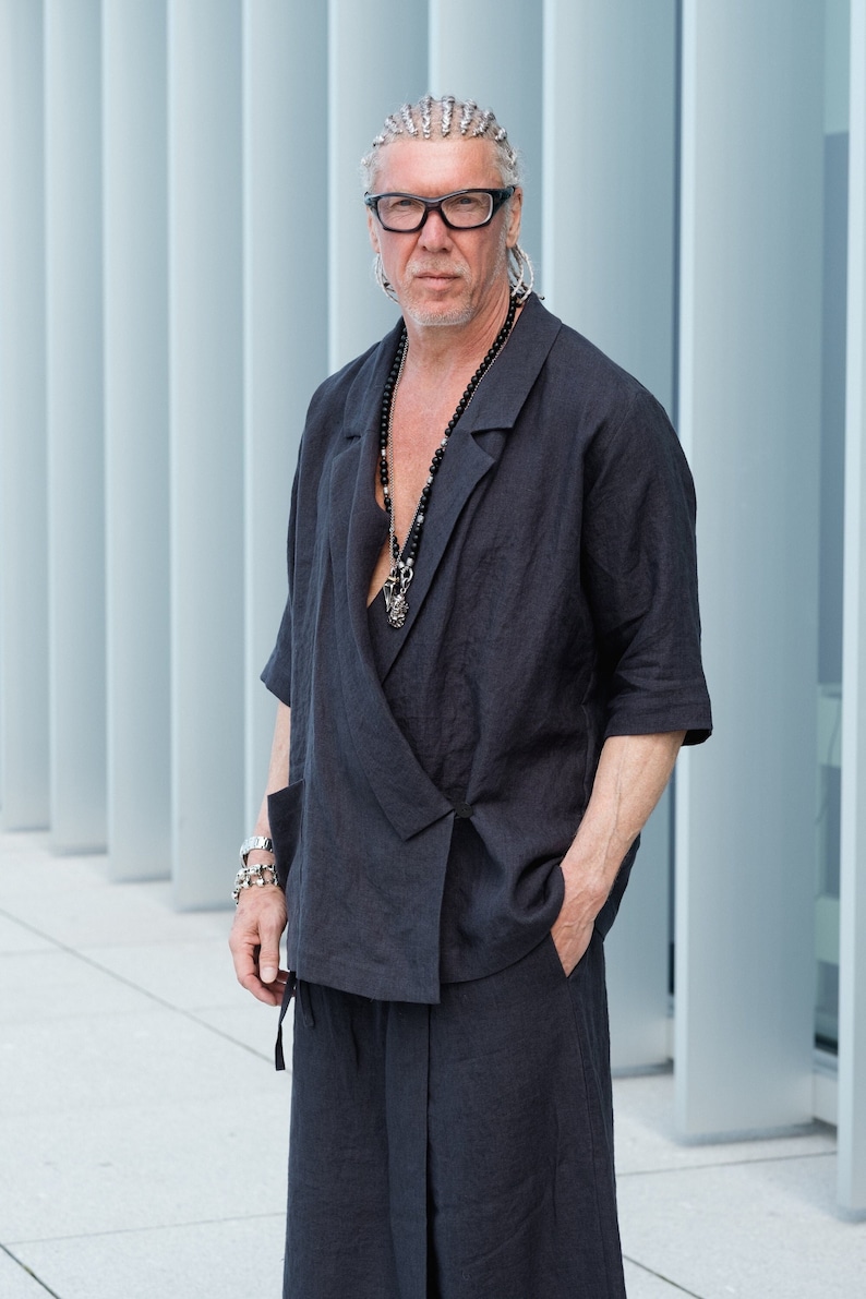 Unisex linen blazer with notched lapels paired with wide-leg pants