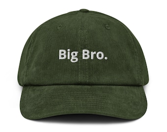 May include: A dark green corduroy baseball cap with the embroidered text "Big Bro." The cap has a curved brim and a structured crown. The text is in a white, sans-serif font.