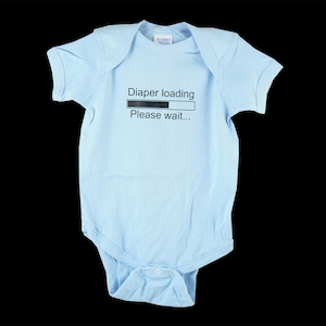 May include: Light blue baby grow with a black and white graphic that says "Diaper loading... Please wait..."