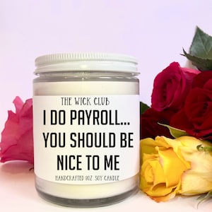 May include: White soy candle with a black label that reads "THE WICK CLUB I DO PAYROLL... YOU SHOULD BE NICE TO ME HANDCRAFTED 8OZ. SOY CANDLE".