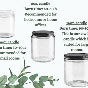 May include: Three glass candle jars with black lids. The jars are labeled with the size and burn time of the candles. The 6oz candle has a burn time of 30-40 hours, the 8oz candle has a burn time of 50-60 hours, and the 16oz candle has a burn time of 90-100 hours.
