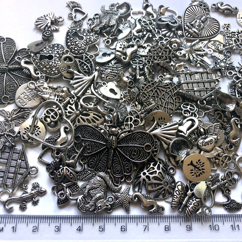 20 grams Tibetan silver BULK MIXED charms jewellery findings