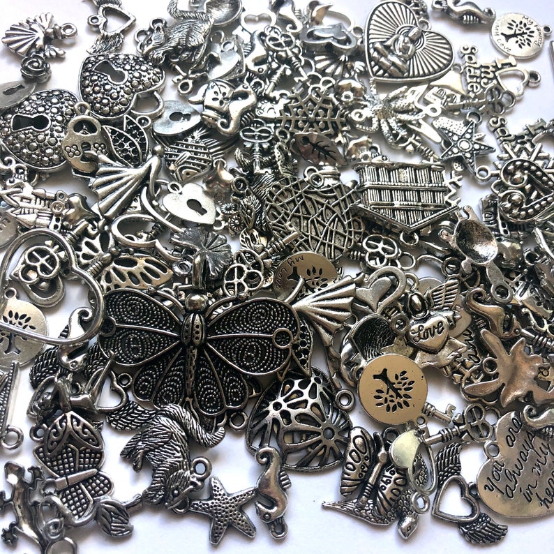 20 grams Tibetan silver BULK MIXED charms jewellery findings