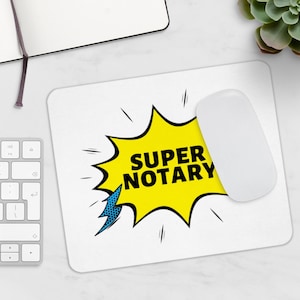 May include: White mouse pad with a yellow speech bubble that says "SUPER NOTARY" in black text. The speech bubble has a blue lightning bolt coming out of it.
