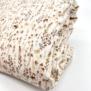 Tissu en coton fleurs séchées sur coton crème à 0,5 m