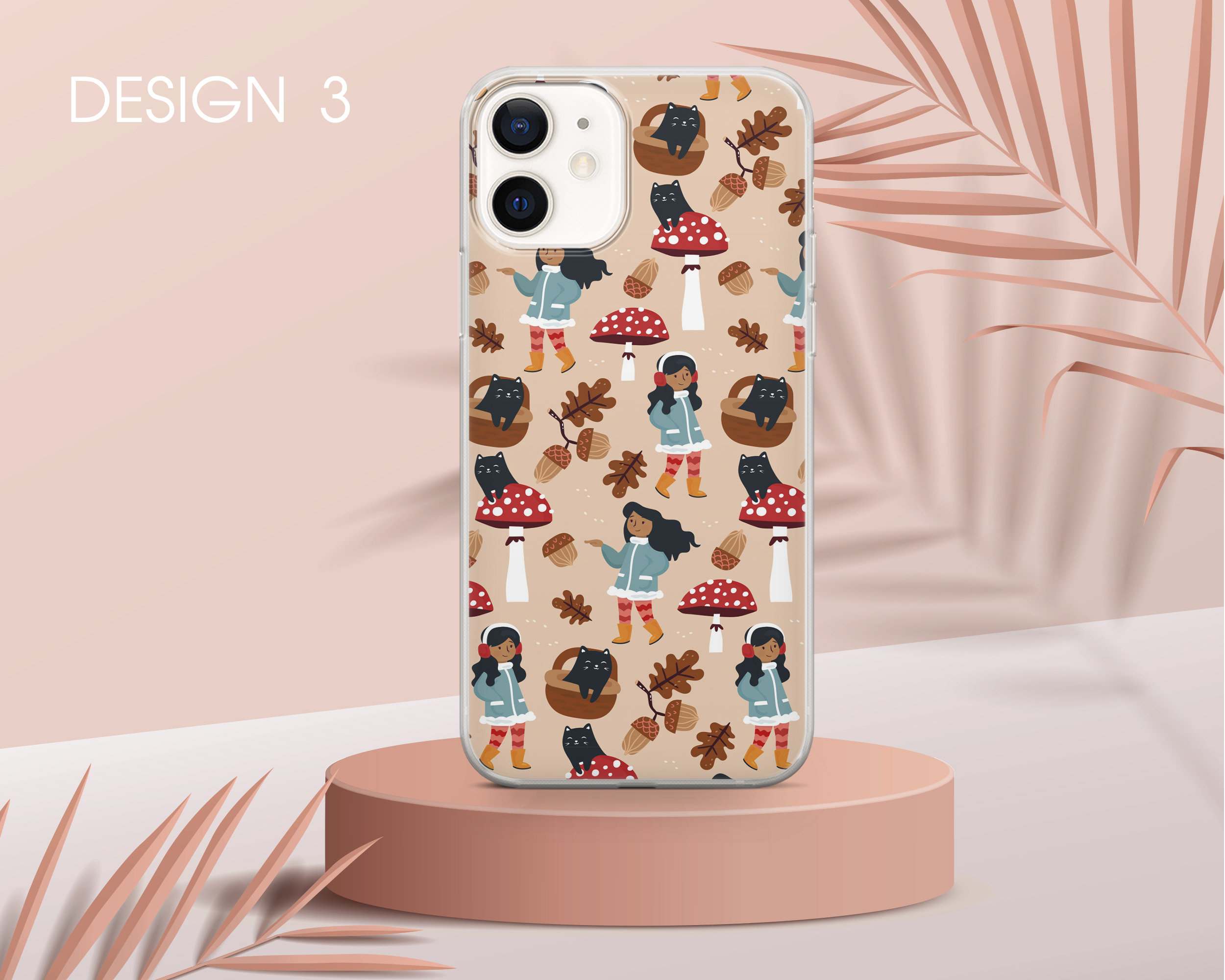 May include: A phone case with a design featuring a repeating pattern of mushrooms, black cats, and girls wearing blue jackets and earmuffs. The background is a light brown colour.