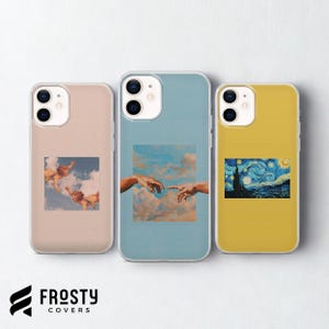 May include: Three smartphone cases featuring artistic prints. The left case is beige with cherubs in clouds. The center case is light blue with a depiction of hands reaching toward each other. The right case is yellow with a starry night landscape.
