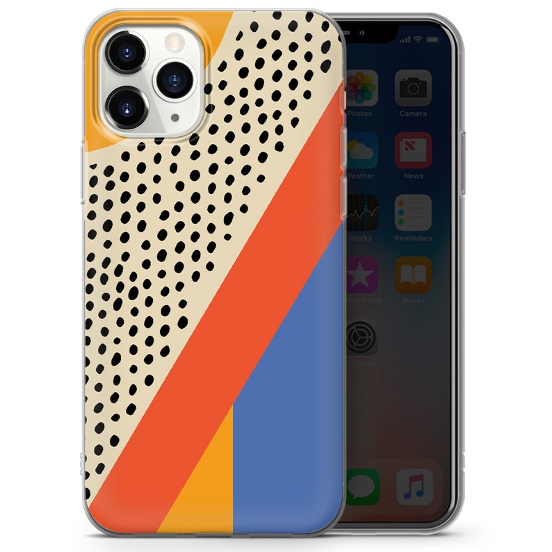 May include: A clear phone case with a geometric design featuring orange, yellow, blue, and black polka dots. The case is designed for an iPhone.