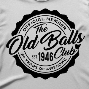 May include: White t-shirt with a black graphic. The graphic is a circular design with the text "OFFICIAL MEMBER The Old Balls Club EST. 1946 80 YEARS OF AWESOME". Below the graphic are the words "SVG PNG DIGITAL DOWNLOAD".