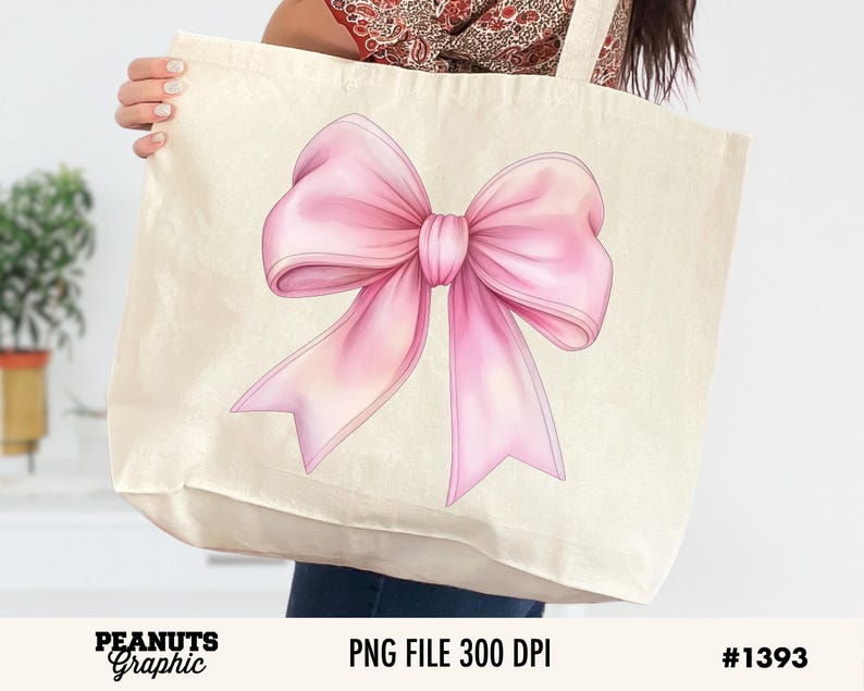 May include: A white tote bag with a pink bow illustration. The bow is large and has a watercolor effect.