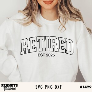 May include: White sweatshirt with black text that reads "Retired EST 2025".